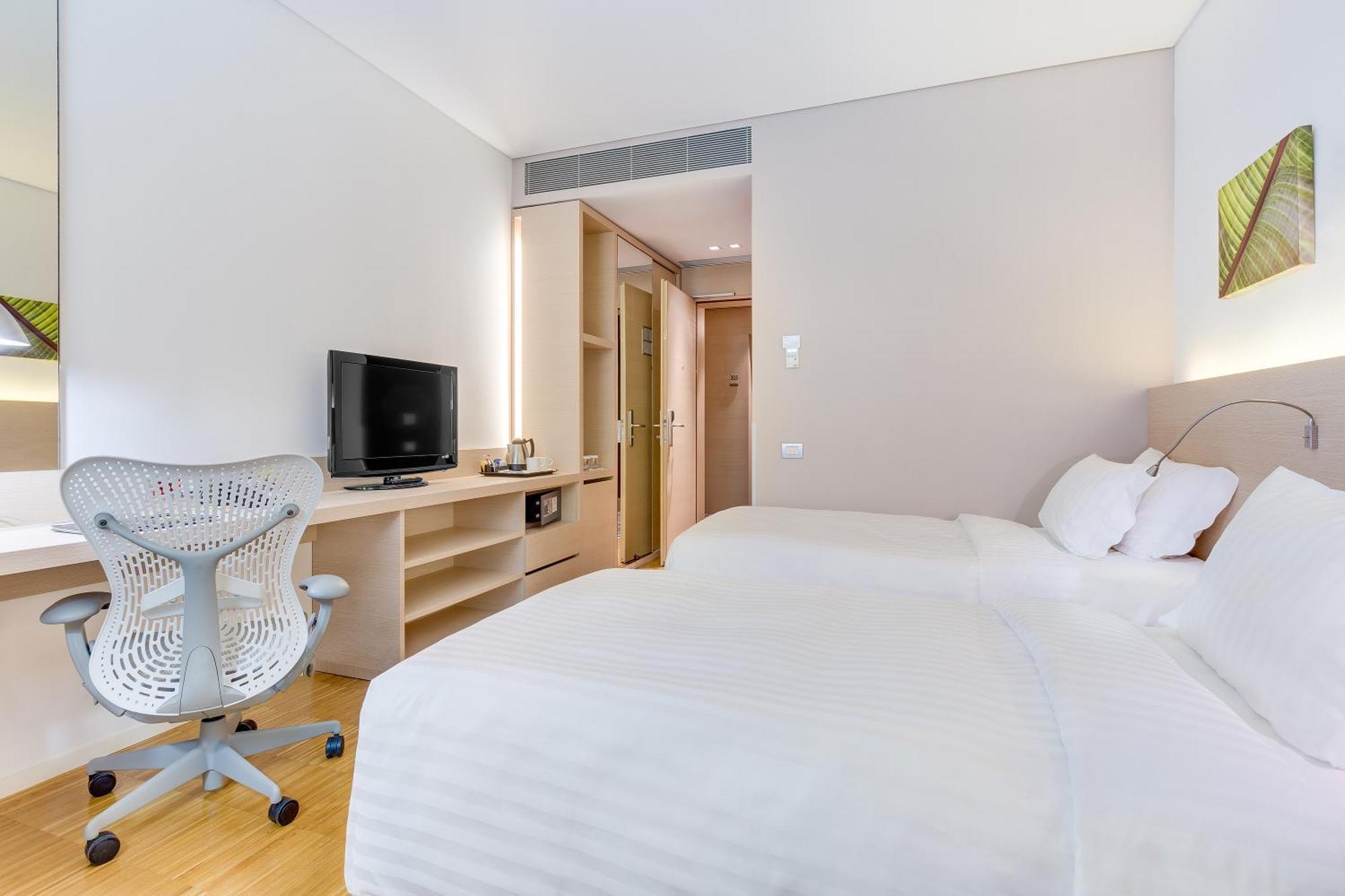 Kamer met 2 Queensize Bedden